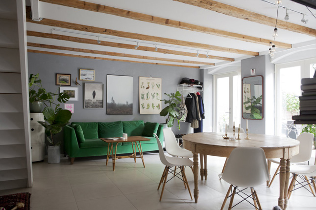 laid-back apartment Sweden scandi interiors dark green