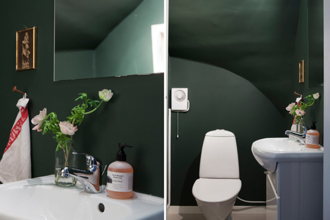 laid-back apartment Sweden scandi interiors dark green