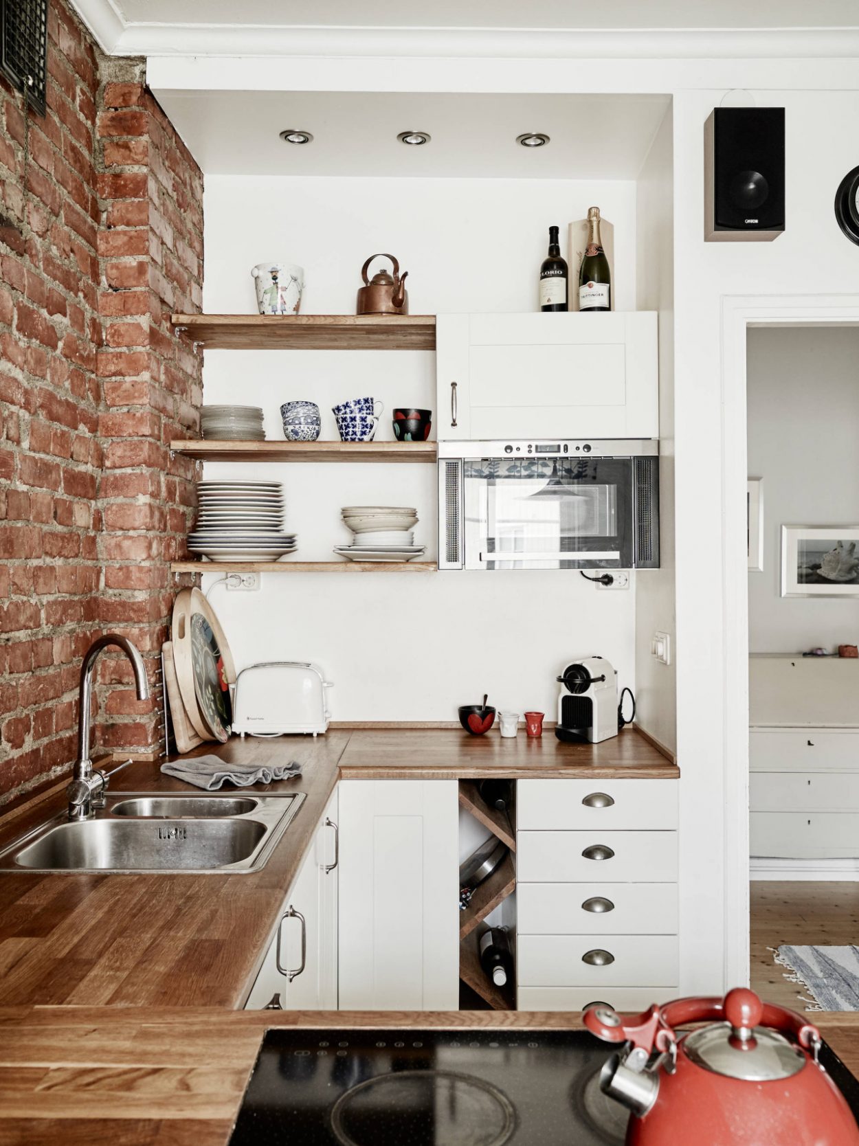 small kitchen with open shelving