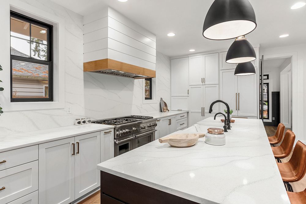 Image of a kitchen with solid surface worktops, available from Noyeks Newmans