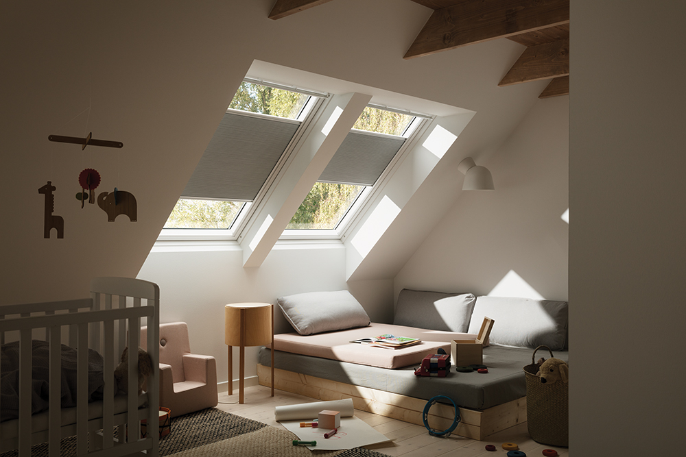 Image of Velux blinds in an loft conversion bedroom