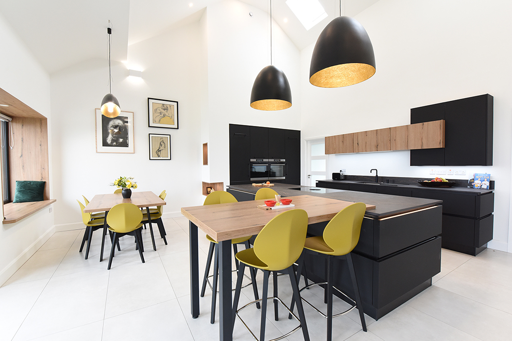 Image of Kube open-plan family kitchen in black