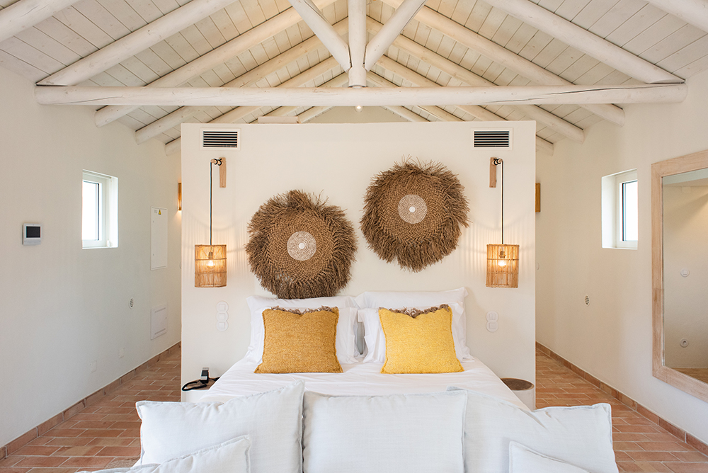 Image of a villa bedroom at the Independente Comporta hotel, Portugal