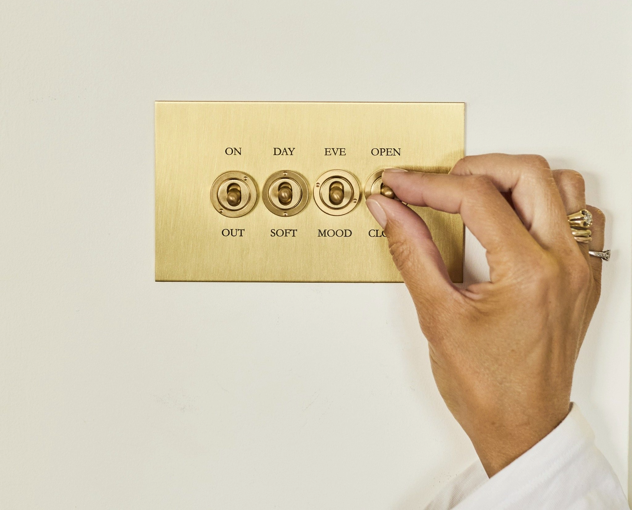 Forbes & Lomax designer brass switches add an elegant touch to interior.