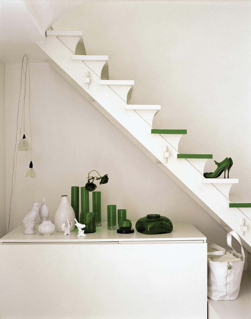 white and green interior with stairs