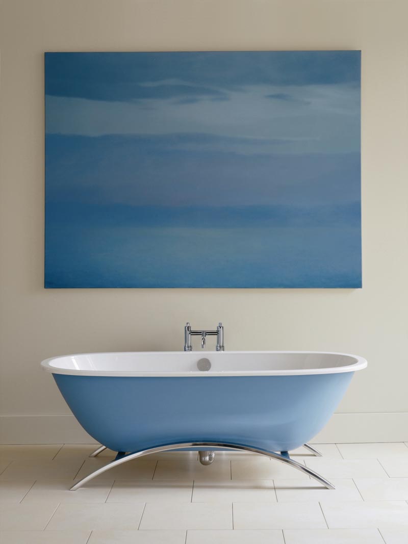 blue and white bathroom with freestanding bath